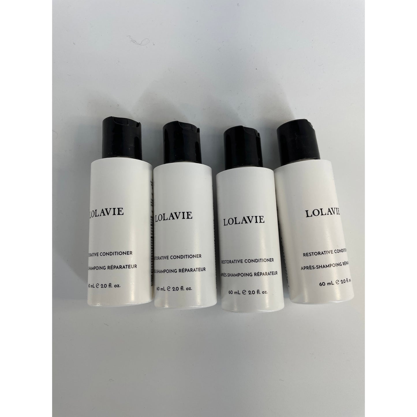 New 4 pack LOLAVIE Jeniffer Aniston travel conditioner 2oz