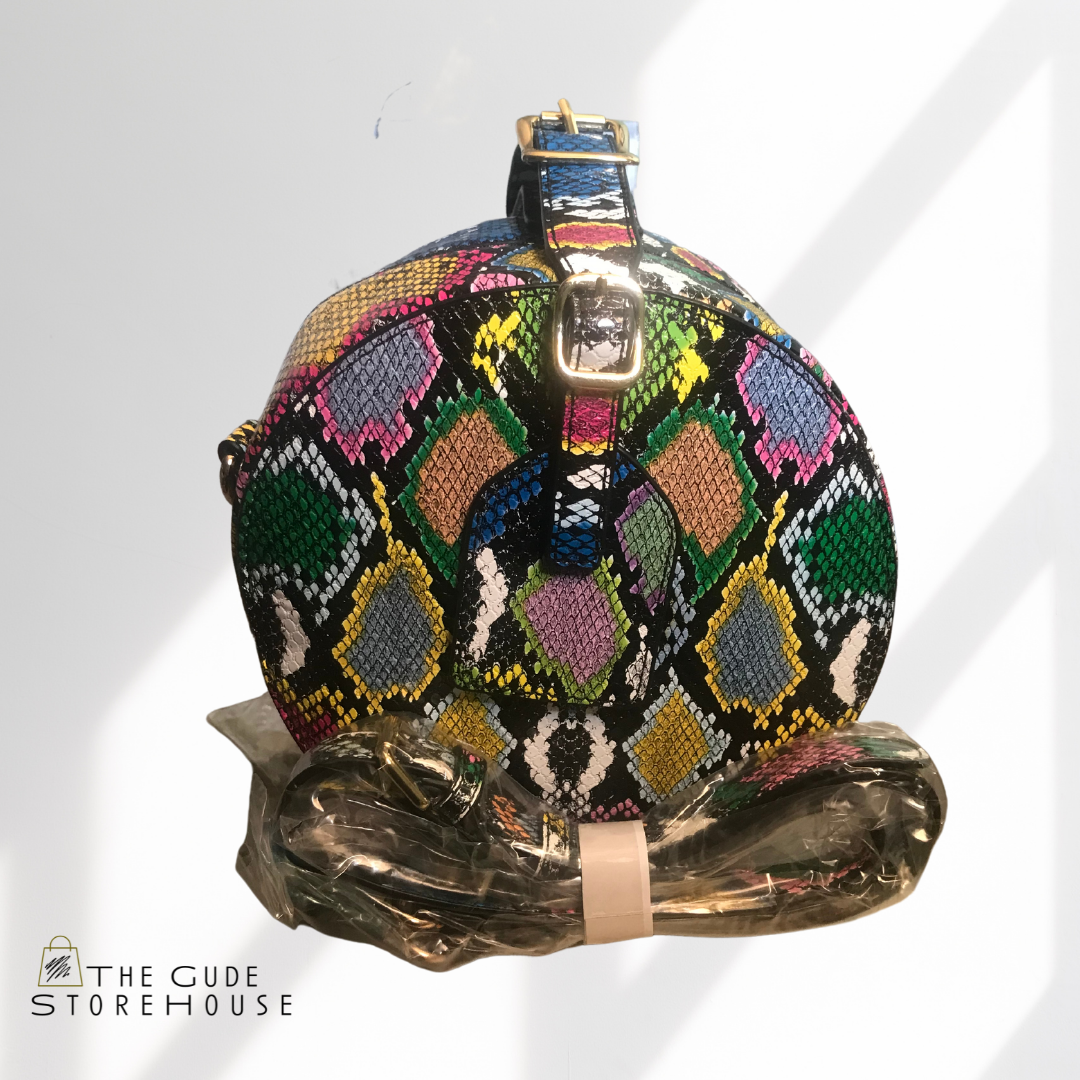 Blue snake print handbag with removable strap. Can be worn as a handbag or crossbody.