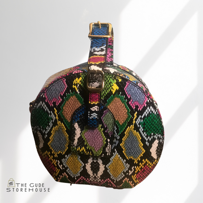 Blue snake print handbag with removable strap. Can be worn as a handbag or crossbody.