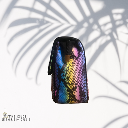 Pink/multi color snake print hand bag. Can also be worn as cross body